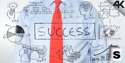 Man Writes Word Success on Transparent Board