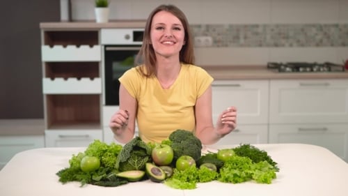 Woman Rejoices at Green Food