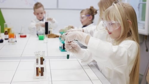 Children Doing Science Experiment in the Lab