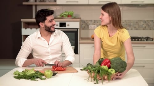 Couple Cooks Healthy Meal
