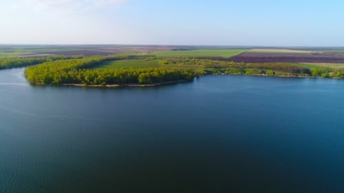 Flying Over the Beautiful Spring River Aerial Camera Shot Ukraine