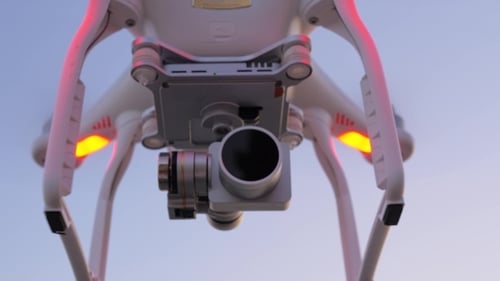 Drone with Camera Flying and Shooting Video