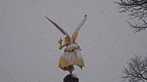 The Angel of Peace on the Top of Friedensengel Monument in Munich, Germany During the Snow Srorm