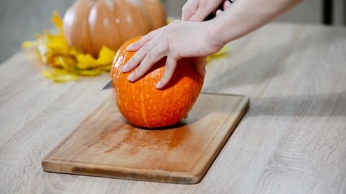 Cutting a Pumpkin in Half on Board