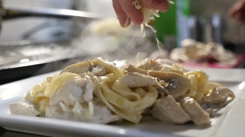 A Delicious Dish From Macaroni and Meat Slices Is Sprinkled with Cheese Chips