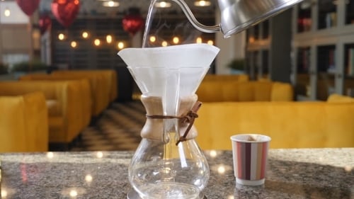 Pour Over Coffee Brewing in Cozy Cafe
