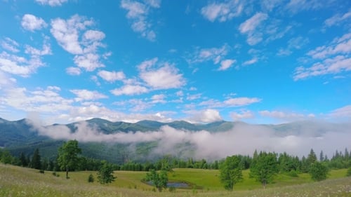 Mountain Landscape with Clouds and Fog