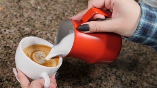 Pouring Milk to Create Beautiful Latte Art