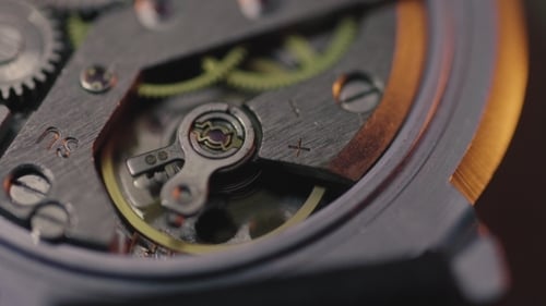 Watch Gears Turning in a Mechanical Clockwork Mechanism
