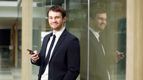 Portrait of Confident Businessman in Modern Office