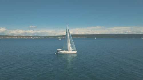 Yacht Sailing Near Beautiful Islands