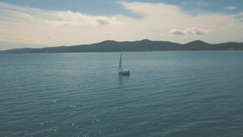 Aerial View of Yacht Sailing Near Beautiful Islands