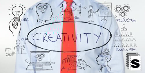 Writing Creativity on Clear Board with Business Graphics