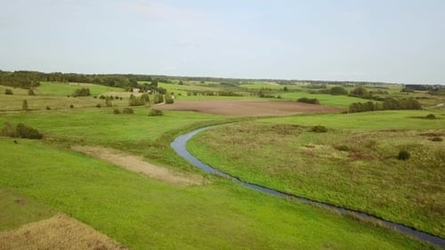 Agricultural Lands Located Along the River in Perfect Weather