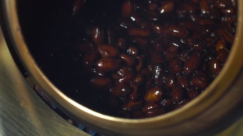Process of Frying the Cocoa Beans in a Machine for Producing Cocoa Beans in Glaze