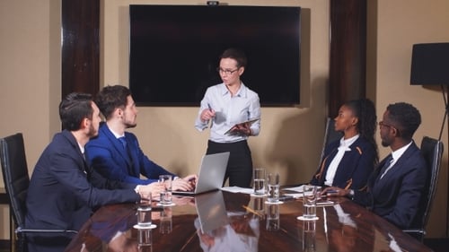 Corporate Meeting in Modern Office with Diverse Team