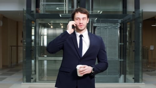Portrait of Confident Businessman in Modern Office.
