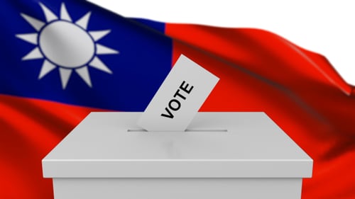 Casting Vote into Ballot Box with Waving Flag Background