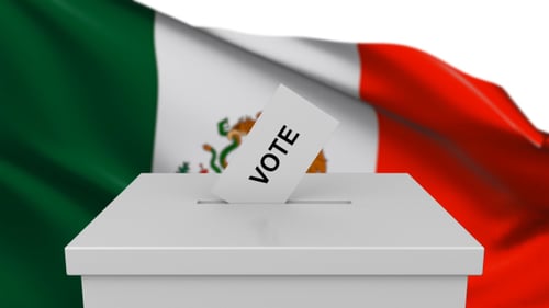 Casting a Vote in a Ballot Box with a Waving Mexico Flag