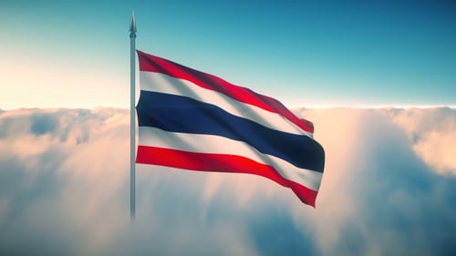 Realistic Waving Flag of Thailand Above Clouds