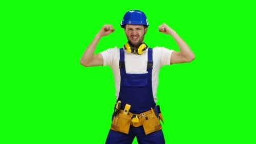 Builder Is Pleased with the Finished Object on Green Screen