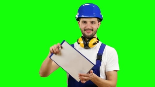 Engineer Picks up the Paper Plate and Smiles of Green Screen