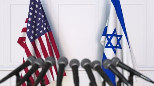 Flags of the USA and Israel at International Press Conference