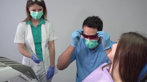 Dentist Working on Patient's Teeth