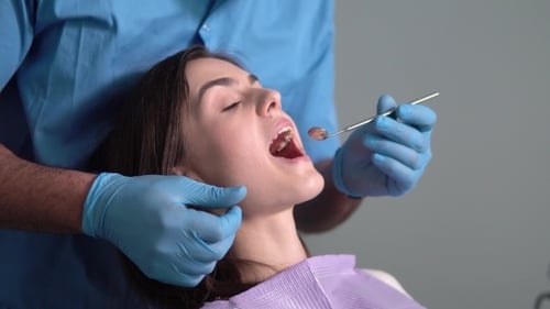 Dentist Checks Teeth