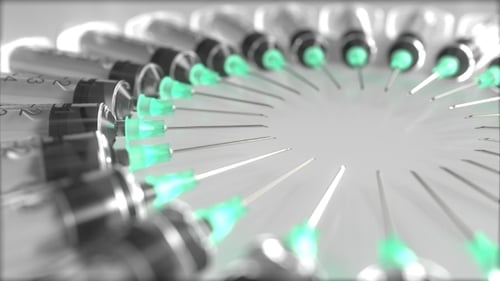 Animated Syringes Forming a Rotating Circle for Medical Presentations