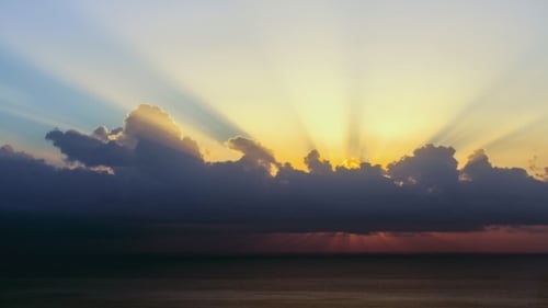 Spectacular Sunrises Over Ominous Thunderstorm on the Horizon
