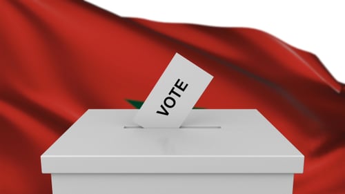 Vote Dropping into Ballot Box for Elections
