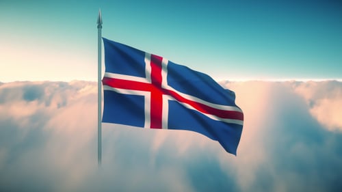 Iceland National Flag Waving Above Clouds