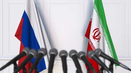 Flags of Russia and Iran at Diplomatic Press Conference