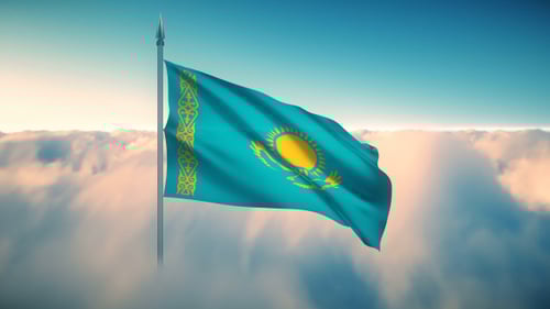 Kazakhstan National Flag Waving in Clear Blue Sky
