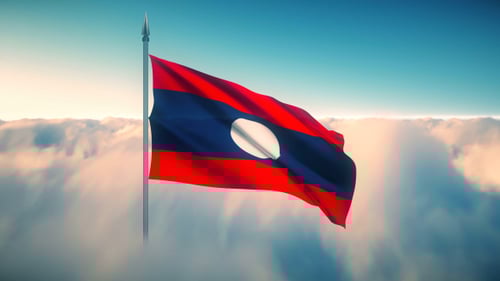Laos National Flag Waving Over Cloudy Sky