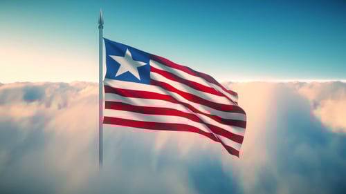 Liberia Flag Waving in Blue Sky with Clouds
