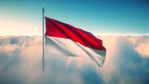 Waving Red and White Flag Over Majestic Clouds