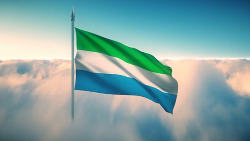 Sierra Leone Flag Waving Against Blue Sky and Clouds