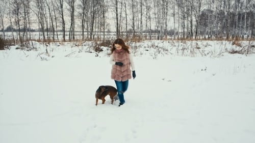 Woman Trainer and Her Dog