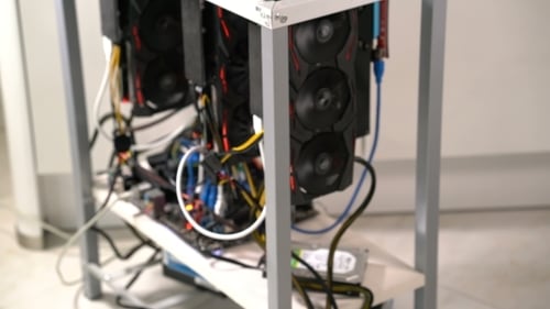 Open Rack for Cryptocurrency Mining Includes Graphics Cards, Motherboard and Hard Drive