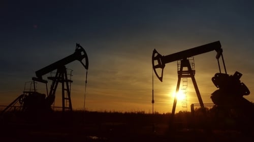 Pump Jacks Working at Colorful Sunrise