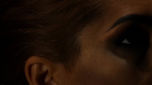 Woman with Dramatic Eye Makeup Close Up
