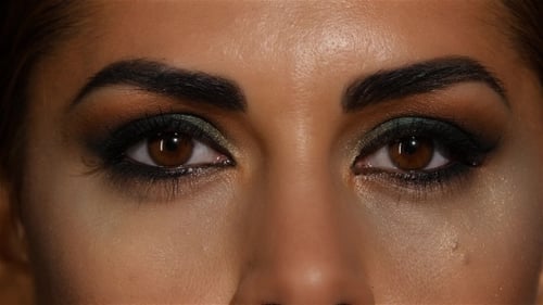 Woman's Eyes with Bold Fashion Makeup Close Up