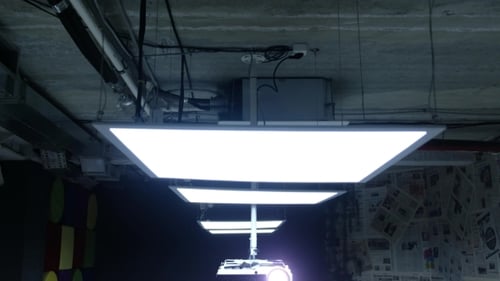 Meeting Zone in the Office in a Loft Style. Projector Shines, Shows Video