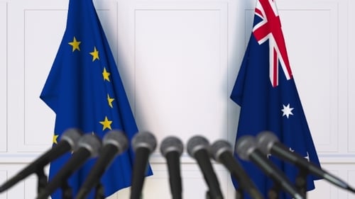 European Union and Australia Flags at Press Conference
