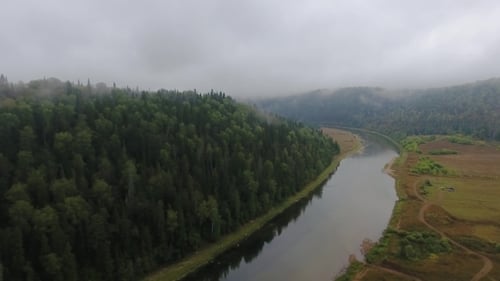 Flying Over the Beautiful Autumn River. Ural, Russia.