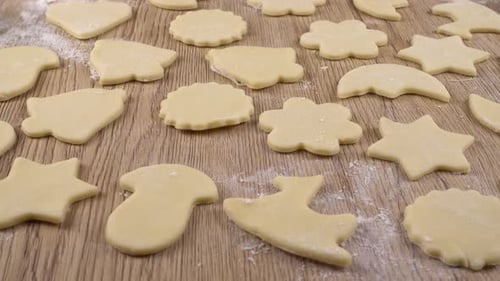 Unbaked Cookie Dough Pieces on Wooden Surface