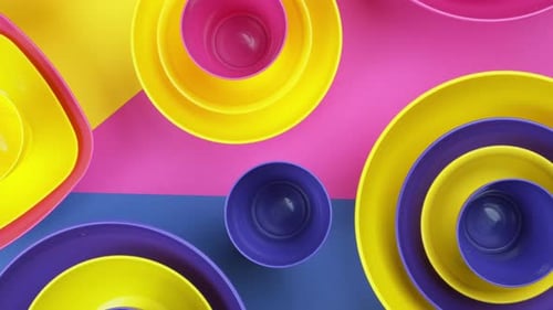 Pink Blue Yellow Colorful Plastic Water Bowls Futuristic Color Design. Footage