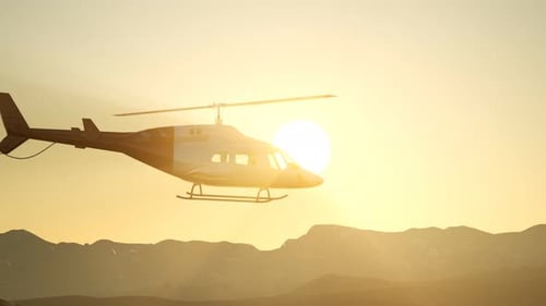 3D Helicopter Flying Over Mountains at Golden Sunset